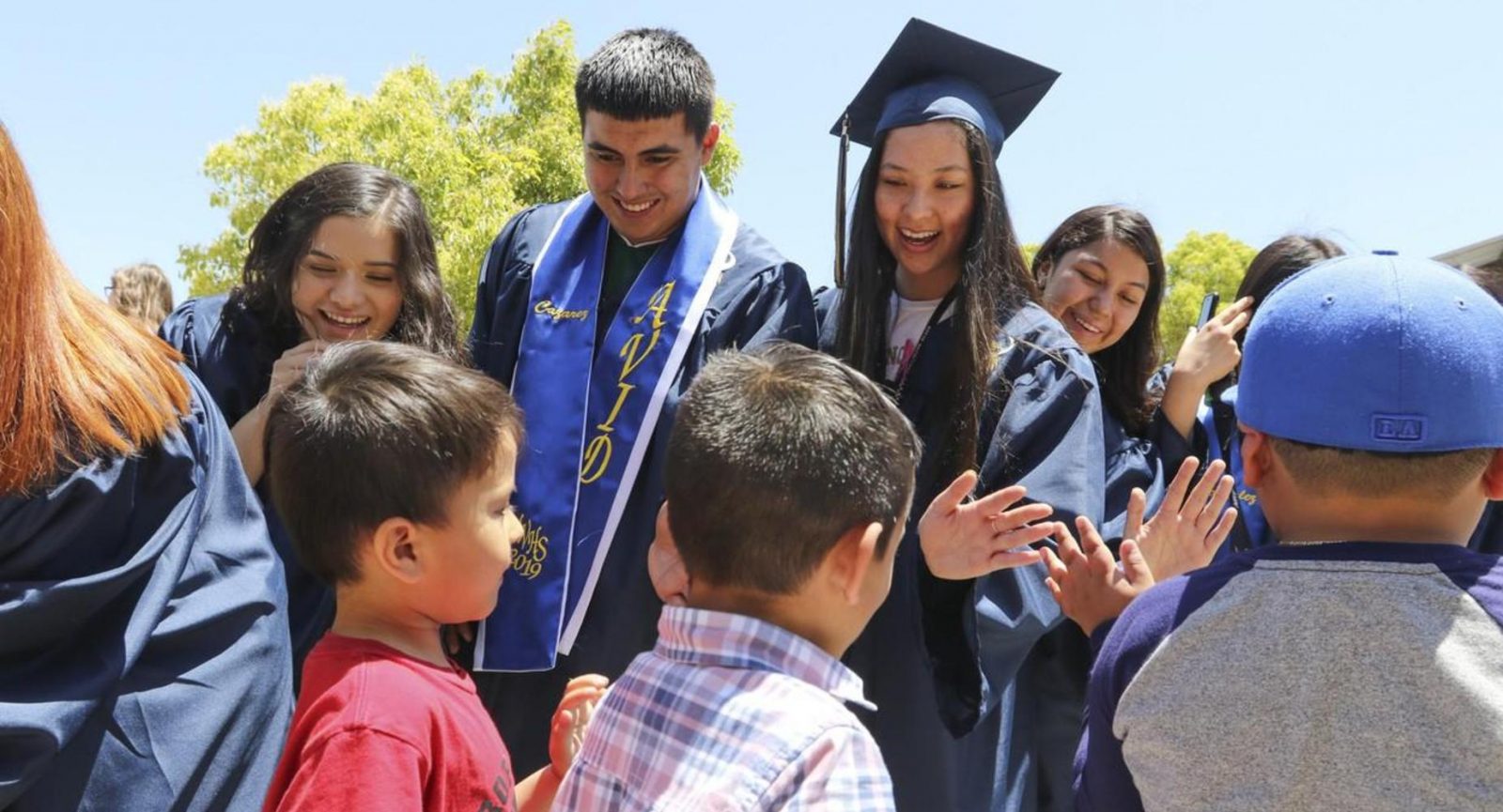 Ceremony that inspires kids to study. foretell AI changes how we care for one another.